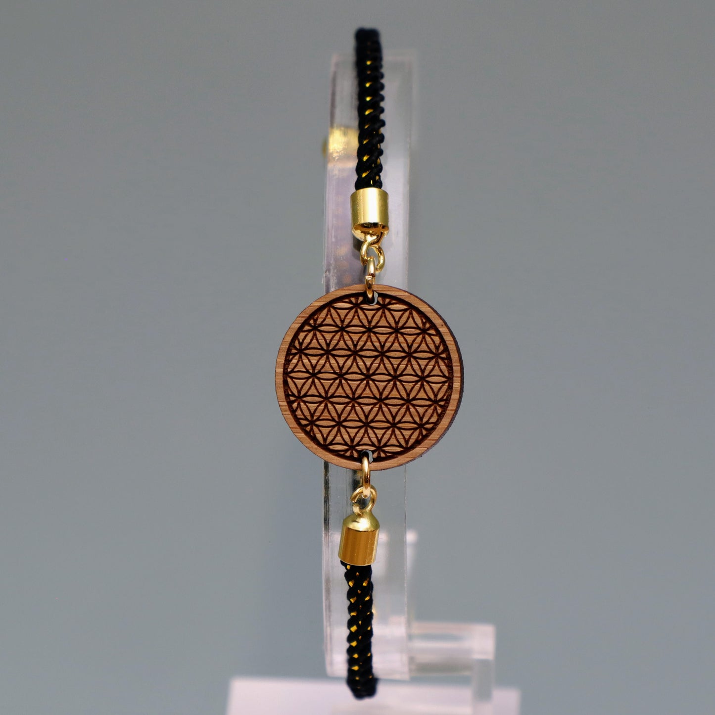 La Fleur de Vie : Harmonie et Équilibre Universel - Bracelet Noir et Doré