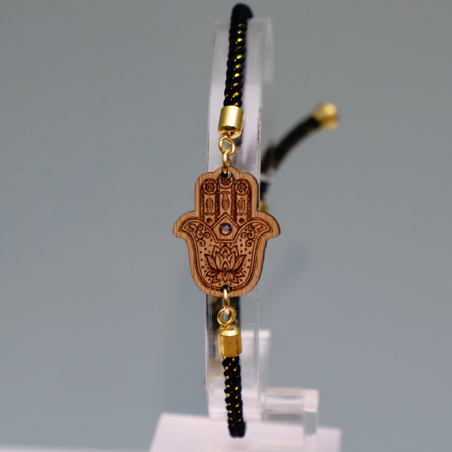 Main de Fatma : Symbole de Protection et de Bienveillance - Bracelet Noir et Doré avec cristal Swarovski