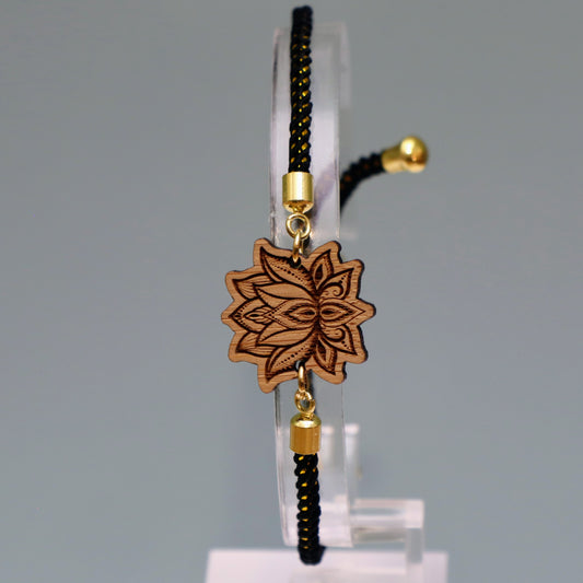 Fleur de Lotus : Symbole de Pureté et de Renaissance - Bracelet Noir et Doré