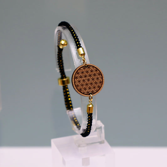 La Fleur de Vie : Harmonie et Équilibre Universel - Bracelet Noir et Doré